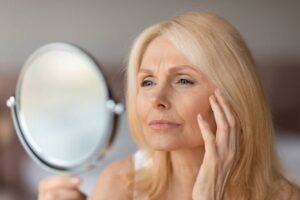 woman checking for eyes bags